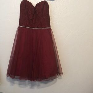 A burgundy dress.